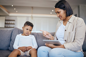 Image showing Mother, child and scolding or discipline, tablet and punishment at home. Parent and daughter, communication and disappointed for cyberbullying, bad behaviour and frustrated for digital mistake