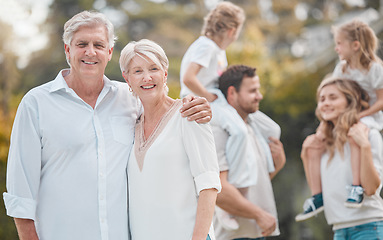 Image showing Portrait of old couple in park together with big family, grandparents and parents with kids in backyard. Nature, happiness and men, women and children in garden with love, support and outdoor bonding
