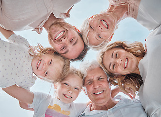 Image showing Happy family, portrait and huddle for bonding together, parents and kids with pov, blue sky and outdoor. Holiday, carefree and grandparents with smile, childhood memories and cheerful for vacation