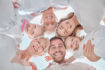 Image showing Family, portrait and huddle in outdoor, happy and parents with kids, pov and blue sky and bonding together. Holiday, carefree and grandparents with smile, childhood memories and joy for vacation