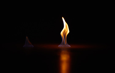 Image showing Flame, heat and fire start with black background with sparks, smoke and light from burning in studio. Fuel, flare and glow from thermal power and art in the dark with creativity and inferno with burn