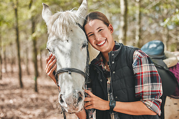 Image showing Portrait of happy woman with horse standing in trees, embrace and love for animals, pets or dressage in forest. Equestrian sport, girl jockey or rider in woods for adventure, pride and smile on face.