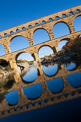 Image showing The Pont du Gard, vertical photography tilted over blue sky. Anc