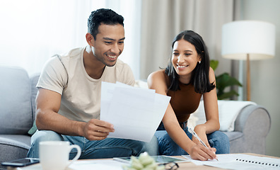 Image showing Happy couple, documents and budget planning in finance, expenses or bills together on sofa at home. Man and woman smile with paperwork in living room for loan, financial plan or insurance at house
