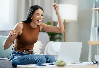 Image showing Woman, winner and yes on laptop and sofa for online education, e learning or virtual school results at home. Excited student with fist, cheers and reading email or news of winning on her computer