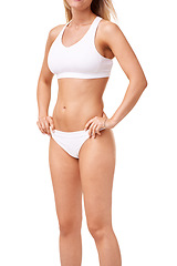 Image showing Wellness, fitness and body of woman in underwear for health, skincare and diet in studio. Confidence, stomach and isolated person in lingerie for workout, lose weight and beauty on white background