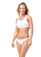 Image showing Portrait, wellness and woman with underwear, body and fitness isolated on a white studio background. Person, girl and model with confidence, bikini and health with a smile, mockup space and energy