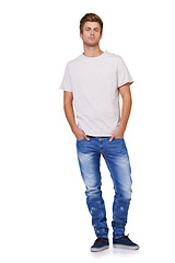 Image showing Style, portrait and young man in a studio with casual, stylish and trendy outfit for confidence. Handsome, cool and full body of male model with tshirt and jeans fashion isolated by white background.