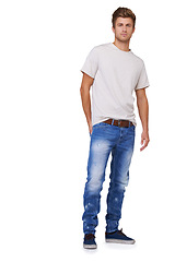 Image showing Fashion, portrait and young man in a studio with casual, stylish and trendy outfit for confidence. Handsome, cool and full body of male model with tshirt and jeans style isolated by white background.