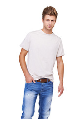 Image showing Fashion, portrait and young man in a studio with casual, stylish and trendy outfit for confidence. Handsome, cool and full body of male model with tshirt and jeans style isolated by white background.