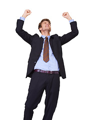 Image showing Business man, winner and yes in studio success, job achievement or winning of bonus, sales or profit. Excited corporate worker with fist, cheers and celebration or opportunity on a white background