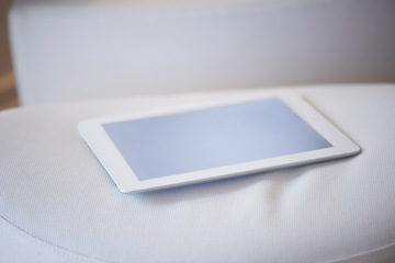 Image showing Tablet screen, internet and mockup on sofa in living room for online, communication or research. Technology, cellular and network for app, website or homepage for social media, post or meme in home