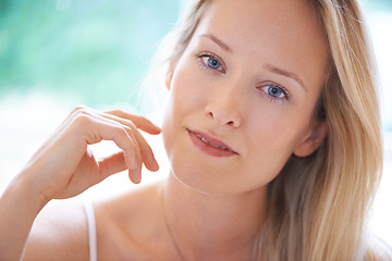 Image showing Portrait, woman and dermatology in home with closeup for skincare, hydration and texture. Female person, looking and hair care with results of anti-aging with vitamin c, collagen or hyaluronic acid