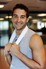 Image showing Man, smile and towel for fitness, portrait and happy for progress, sweating and care at gym. Male person, wellness and face for cardio, workout and pride for training, positive mindset and confident