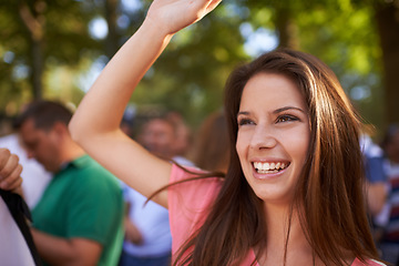 Image showing Dance, party and music festival with woman in crowd for celebration, smile and energy. Dancer, new years concert and rock event with happy person in countryside for social, rave club and summer disco