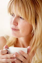 Image showing Relax, thinking and woman with coffee, ideas and daydreaming with inspiration, decision and weekend break. Person, home and girl with a cup of tea, espresso and latte with cappuccino and solution