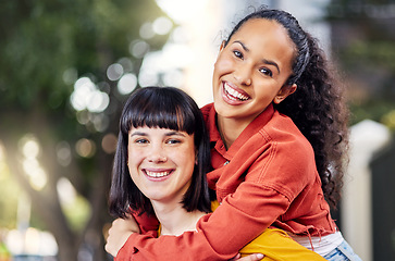 Image showing Couple of friends, lesbian and piggyback portrait outdoor for fun, travel and happiness or love on vacation. Young people in city for holiday or playful trip with a smile and joy to hangout in summer