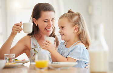 Image showing Mom, girl and breakfast in home with tea cup, comic laugh and relax with drink, food and bonding at table. Love, mother and daughter with coffee, juice and smile with care, happy and family house