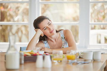 Image showing Woman, thinking and breakfast at table, home and ideas with drink, food and nutrition to start morning. Girl, vision and memory with choice, decision and lunch with juice, milk or fruits in house