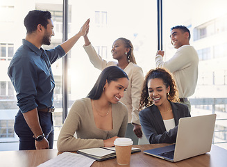 Image showing People, high five and success in office with teamwork, collaboration and support for work in startup. Group, celebration and achievement of goals or kpi challenge in workplace and employees on laptop