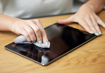 Image showing Hand, wipe tablet and cloth for screen, dust and dirt with shine on glass, hygiene or disinfection in home. Woman, digital touchscreen and fabric, material or sanitation for bacteria, virus or health