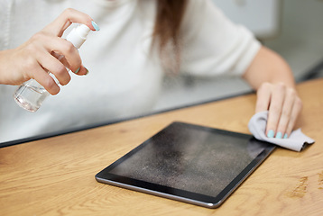 Image showing Hand, spray tablet and cleaning for screen, dust and dirt with shine on glass, hygiene and cloth in home. Woman, digital touchscreen and fabric, chemical and sanitation for bacteria, virus or health