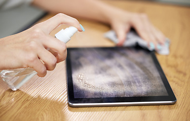 Image showing Hands, spray tablet and cleaning with wipe, dust and dirt with shine on screen, hygiene and cloth in home. Woman, digital touchscreen and fabric, chemical and sanitation for bacteria, virus and glass