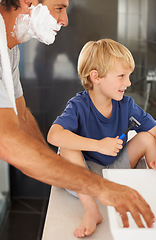 Image showing Shaving, father and son with cream on face, smile and bonding in home with morning routine. Teaching, learning and dad with happy child with razor in bathroom for shave, cleaning or grooming together