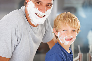Image showing Shaving, portrait of father and child with cream on face, smile and bonding in home with morning routine. Teaching, learning and dad with happy son in bathroom for shave, fun and grooming together.