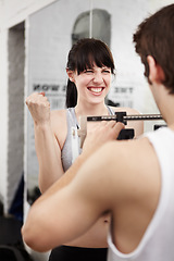 Image showing Weigh, personal trainer and woman with fitness, progress and challenge with motivation, celebration and excited. People, athlete or coach with achievement, happiness and training with exercise in gym