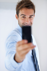 Image showing Happy businessman, selfie and photography for memory, social media or online vlog at office. Portrait of handsome man, face or employee smile for photograph, picture or business fashion at workplace