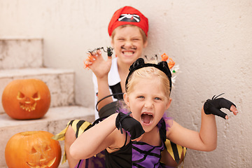 Image showing Siblings, portrait and halloween costume by outdoor, theme paint and happiness in childhood. Boy, girl or scary face for holiday party event with pumpkin, excited fairy or pirate by backyard stairs