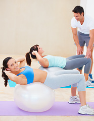 Image showing Fitness club, exercise ball or women with coach for wellness, training or weight loss. Sports studio, portrait or people with personal trainer for abs crunch, workout or body transformation challenge