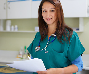 Image showing Veterinary portrait, clinic paperwork and happy woman with test results, assessment notes or healthcare documents. Pet healing services, happiness and hospital veterinarian smile for vet feedback