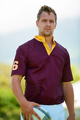 Image showing Portrait, ball and a man rugby player outdoor for sports, fitness or training at a club in uniform. Health, exercise and a strong youth athlete on a field for a workout to improve skill or technique