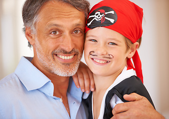 Image showing Family, portrait and father with son for halloween party, home and face paint for happiness in childhood. Man, child and holiday event, pirate costume and love for celebration together with wellness
