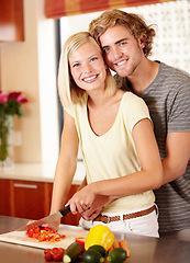 Image showing Couple, portrait and cutting vegetables in kitchen for healthy nutrition, dinner meal or vegetarian diet. Man, woman and face for cooking preparation for vitamin food together, home for eating hungry