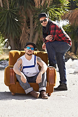 Image showing Couch, hipster and portrait of men in city in hip hop fashion, trendy clothes and casual outfit. Friends, sunglasses and people on sofa in street for urban neighborhood culture, streetwear and gang