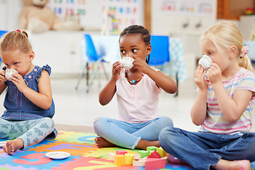 Image showing Girls, children and playing with tea party, happiness and fun with students, imagination and relax. Group, friends and kids with toys, creative and education with child development, learning or smile