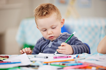 Image showing Face, kid and pencil for drawing in classroom for learning, education and development of motor skills. Little boy, student or learner with coloring activity for growth, future or milestone in daycare