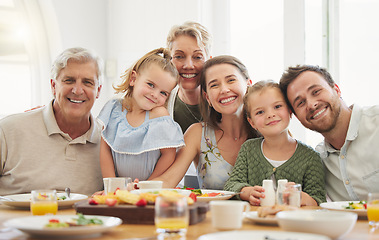 Image showing Breakfast, family and portrait with parents, kid and happy grandparent together in a home. Love, support and care on a dining room with a smile and food with bonding in the morning with fruit