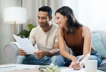 Image showing Happy couple, documents and finance on sofa in budget planning, expenses or bills together at home. Man and woman smile with paperwork in living room for loan, financial plan or insurance at house