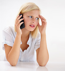 Image showing Young woman, phone call and stress, confused or worried for bad news, bankruptcy or home debt. Person listening on mobile and thinking of budget mistake or wrong decision on wall or white background