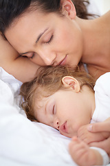 Image showing Mom, baby and kid sleeping on bed together for calm break, peace or dreaming to relax at home. Face of tired mother, young child and cozy nap for newborn development, healthy childhood growth or rest