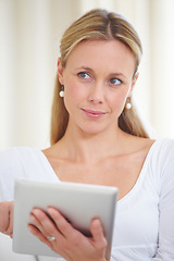 Image showing Mature woman, tablet and thinking in home, serious face and living room couch. Social media, technology and communication for scrolling, vision and idea with connection, streaming and contemplating