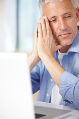 Image showing Mature man, laptop and thinking in home, serious face and stress for business. Hands, technology and communication for problems, vision and concerned with remote work, overworked and contemplating