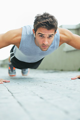Image showing Man, portrait and push ups in fitness for workout, exercise or outdoor training on floor. Muscular male person or athlete lifting body weight for strength, muscle or endurance in health and wellness