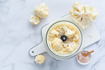 Image showing Preparing  cauliflower rice in a food processor, cauliflower in a blender.