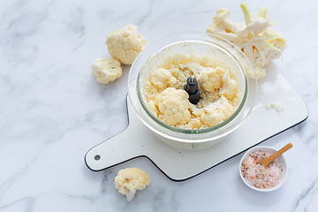 Image showing Preparing  cauliflower rice in a food processor, cauliflower in a blender.