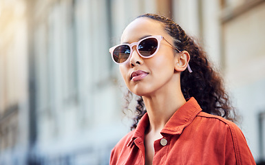 Image showing Woman, city and thinking in sunglasses on street for search, location or memory in metro. Girl, walking and fashion for vision by building, idea or urban vacation for decision, choice or road in Rome